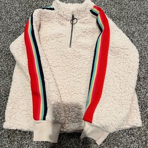 Tucker and rate beige Sherpa with rainbow trim
